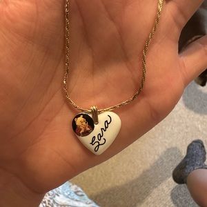 Disney pendent with “Sara” and poo bear